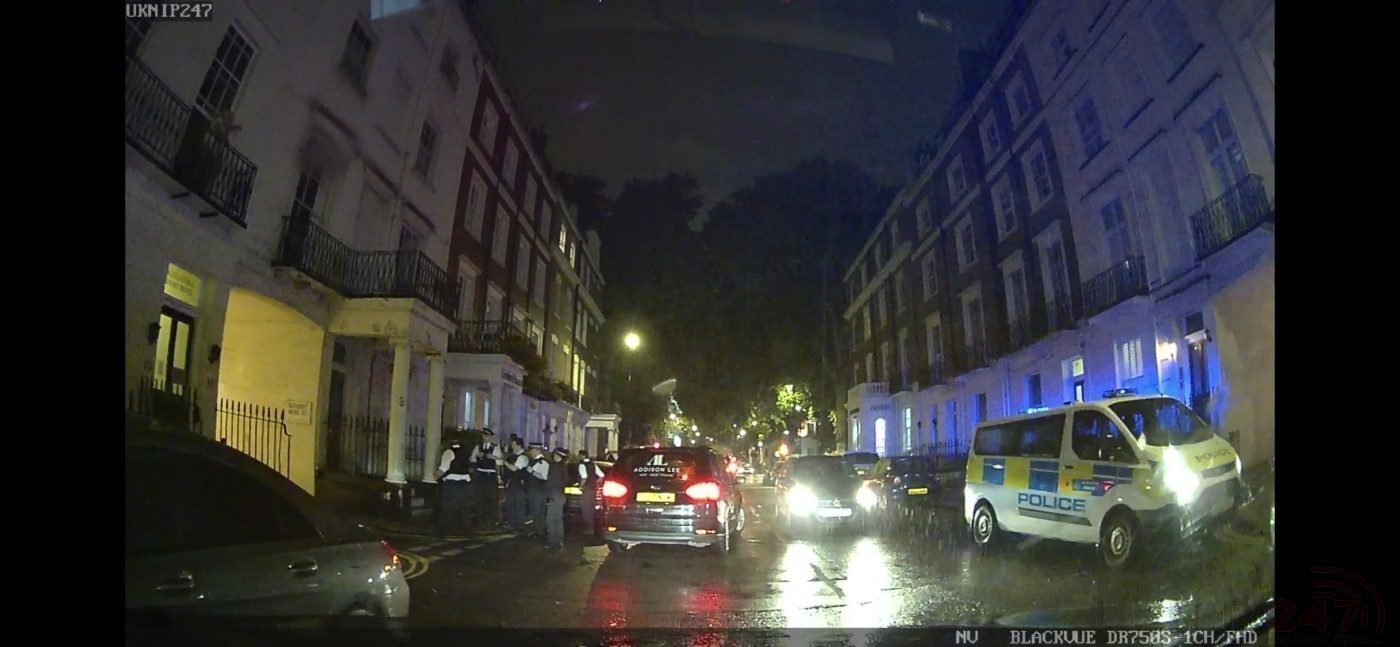 Large Number Of Police Detain Minicab Driver  On Sussex Place In West London