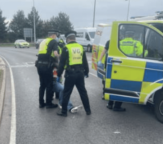 Insulate Britain Glue Hands To The Tarmac On M25