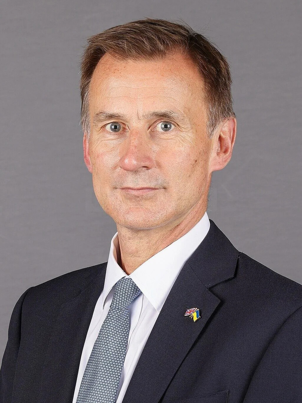 Sunak Concedes Defeat as Hunt Narrowly Retains Seat