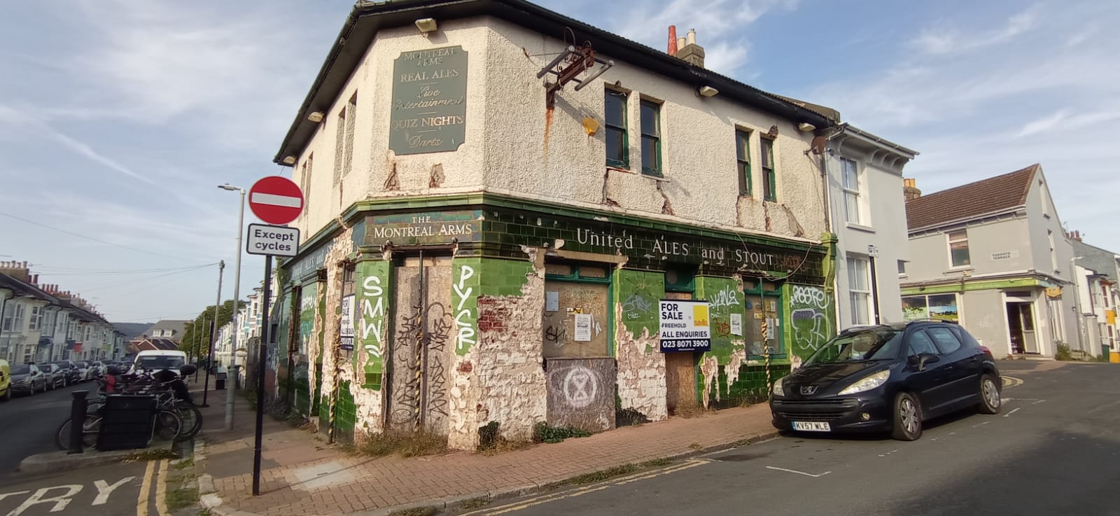 Heritage Tensions at the Montreal Arms: A Developer Seeks to Strip Iconic Tiles Ahead of Renovation