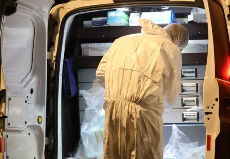 Man Held After Woman Found Dead in Home