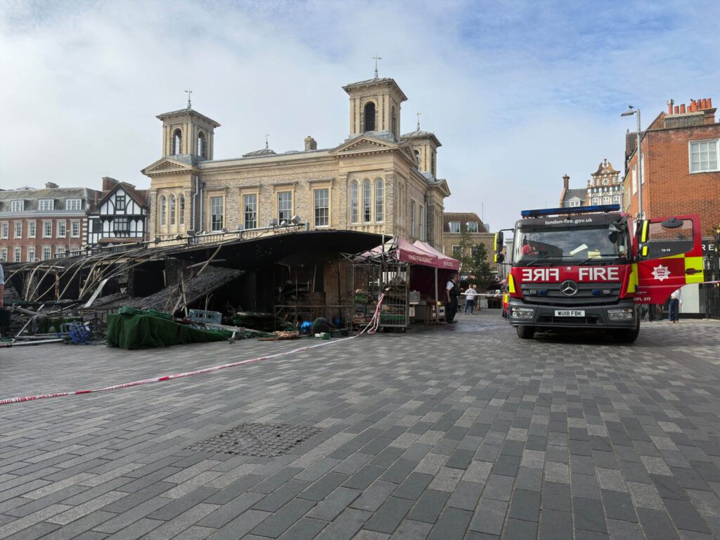 Eight people evacuated as fire tears through historic Kingston market