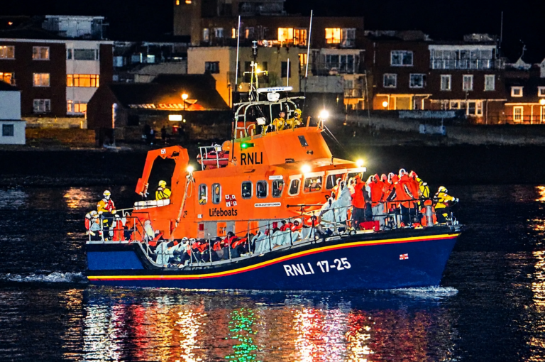 Two men die and women seriously burned in Channel crossing as 12 arrested at Gosport protest